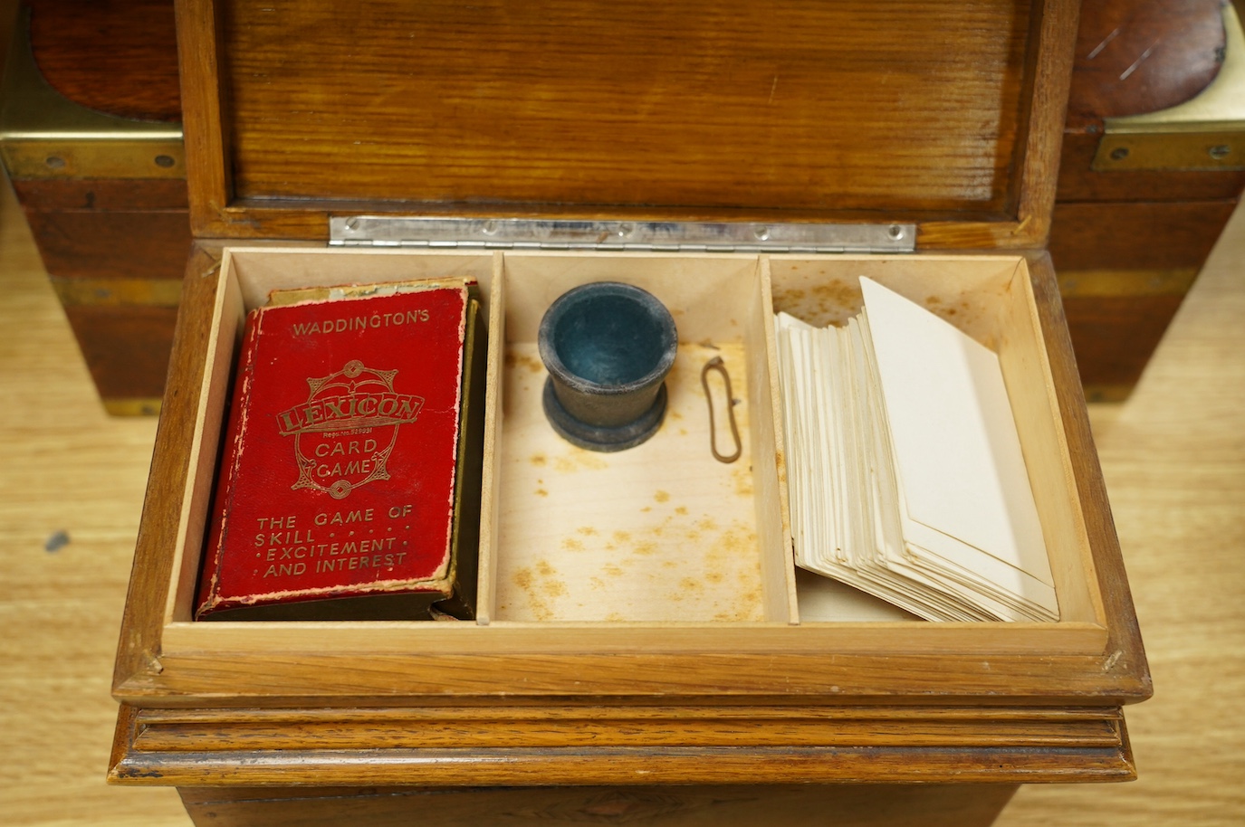 Five Victorian and later boxes to include a brass bound mahogany writing box and an inlaid work box, largest 40cm wide. Condition - poor to fair